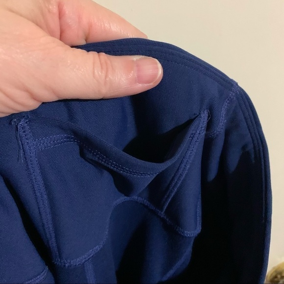 Fabletics  High Waisted Cold Weather Pocket Navy Leggings. - Picture 6 of 10